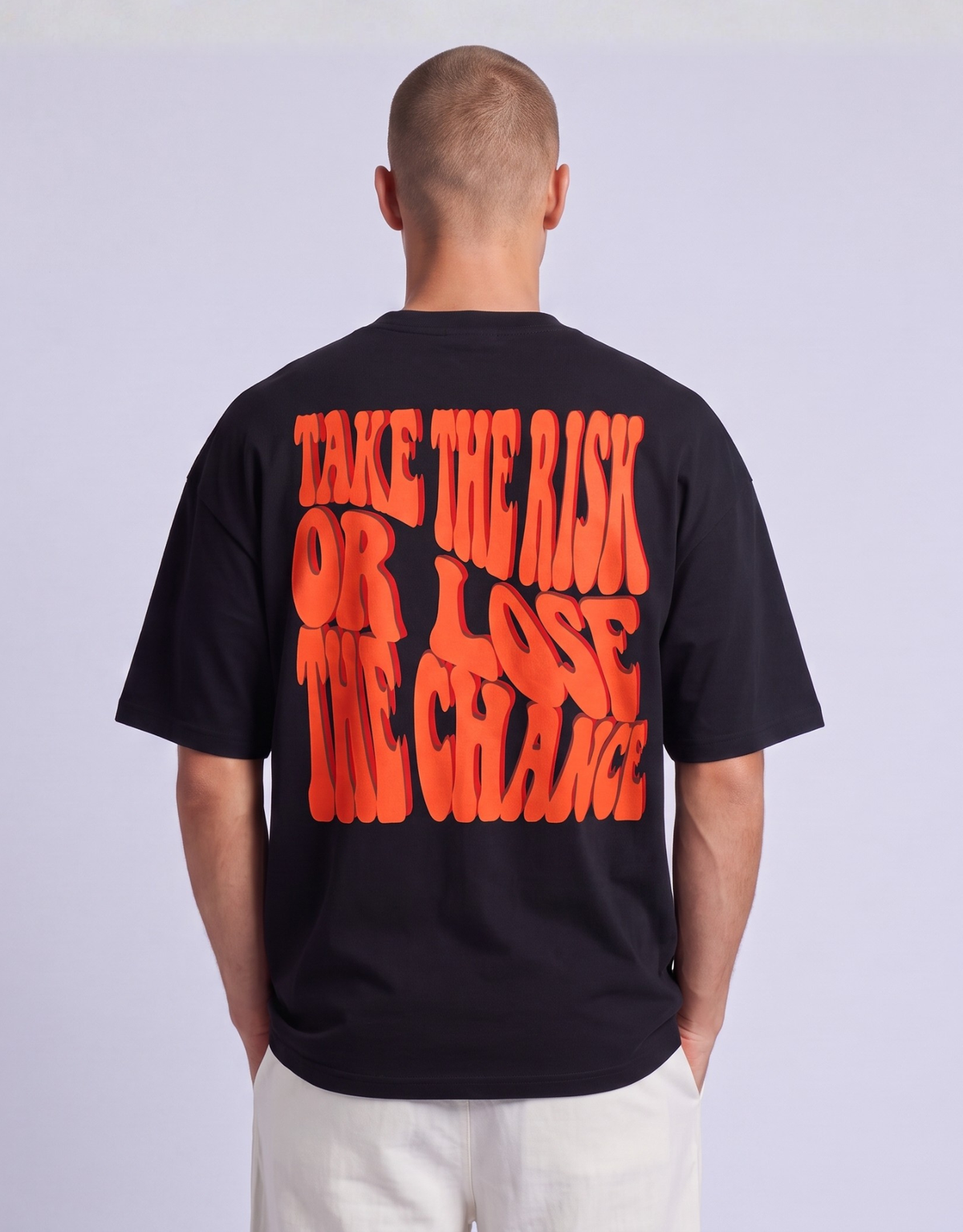 Camiseta oversized MALTA® Take the Risk preta, costas com a frase “take the risk or lose the chance”