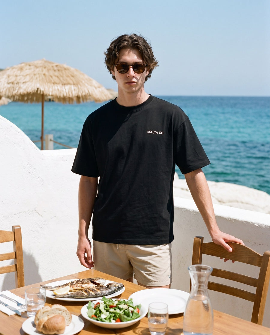 Camiseta oversized MALTA® bad choices às 12h: volta da praia