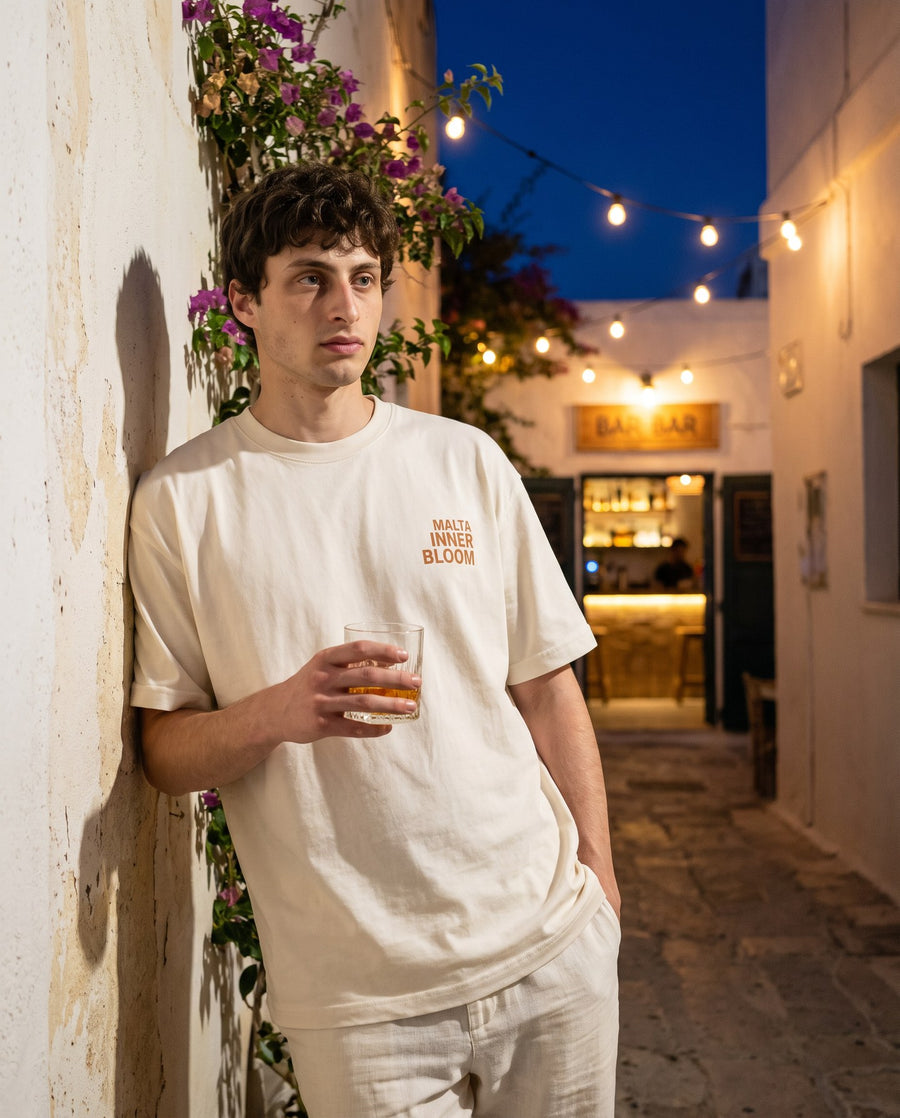 Camiseta oversized MALTA® innerbloom às 23h: noite que não estava nos planos