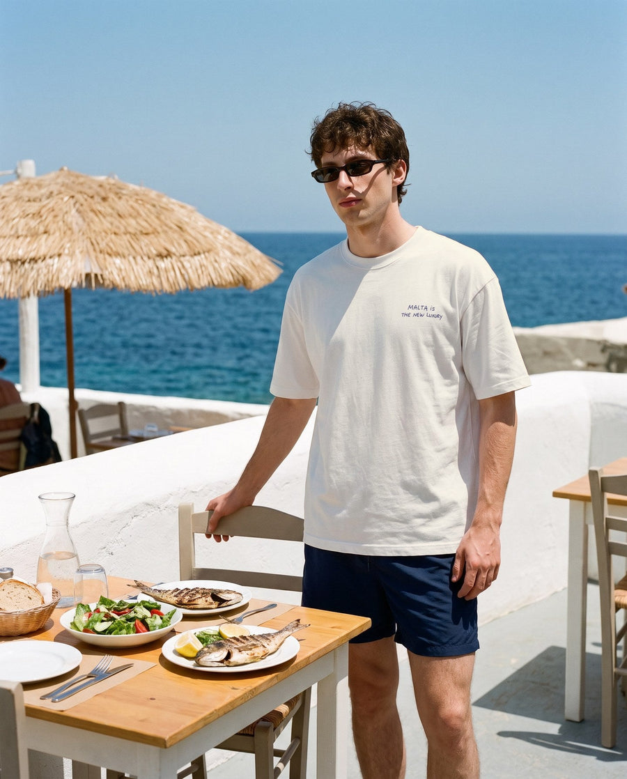 Camiseta oversized MALTA® offline luxury às 12h: volta da praia